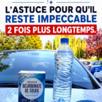 Pare-brise propre et brillant sur une voiture garée sous le soleil