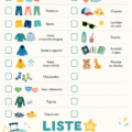 Valise colorée ouverte avec des vêtements et jouets pour enfants.