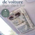 Organisateur de voiture fait maison en tissu coloré, accroché au siège avant.